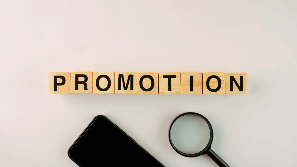promotionの文字と虫眼鏡とスマホ